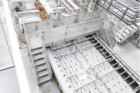 Les sauts de loup de Günzburger Steigtechnik peuvent être personnalisés en fonction des besoins. Ils assurent ainsi une sécurité maximale au travail et un gain en matière d’efficacité dans les installations de production et de transport.  | © MUNK GmbH