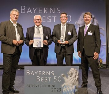 The Munk Group has once again been awarded the Bavaria's Best 50 prize. In the photo, from left: State Secretary for Economic Affairs Roland Weigert, Ferdinand Munk (owner and Managing Director Munk Group), Alexander Werdich (also Managing Director) and Marcus von Goldacker, partner of the auditing company Mazars GmbH, representing the jury. | © Studio SX Heuser