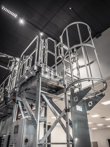 Special construction in the MUNK Customer Centre with platform and several vertical ladder types